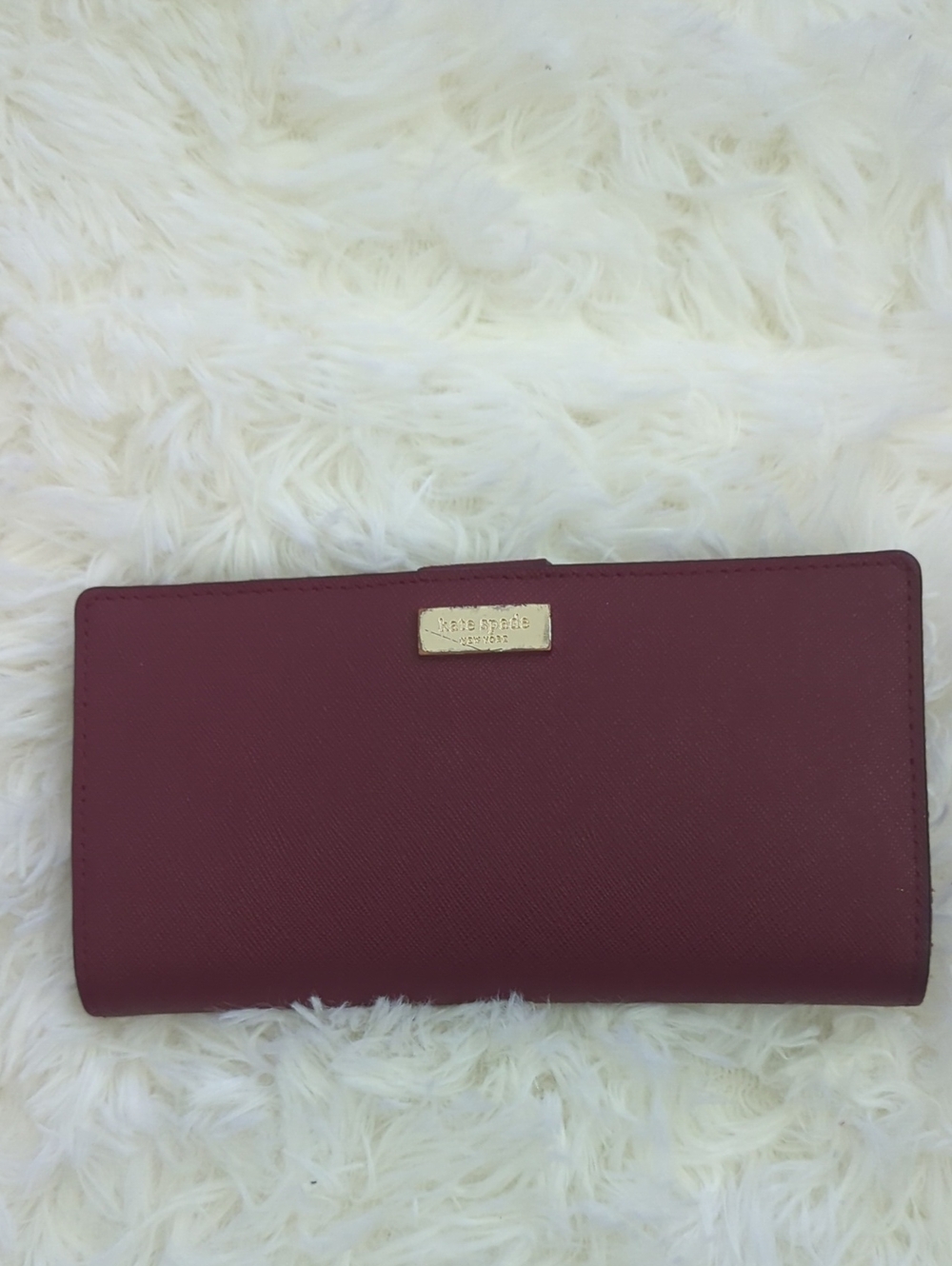kate spade burgundy continental wallet with gold plaque